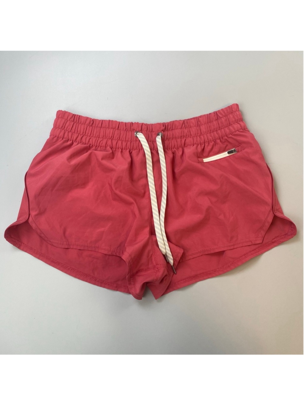Vuori Women's Athletic Shorts in Coral Pink with White Drawstring